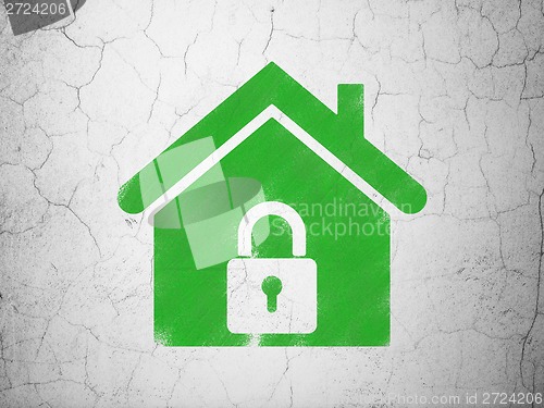 Image of Protection concept: Home on wall background