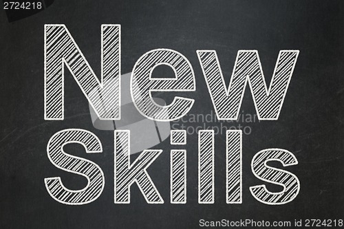 Image of Education concept: New Skills on chalkboard background