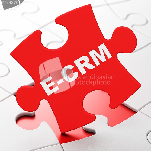 Image of Business concept: E-CRM on puzzle background