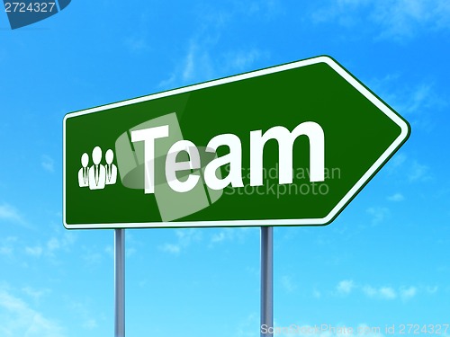 Image of Finance concept: Team and Business People on road sign background