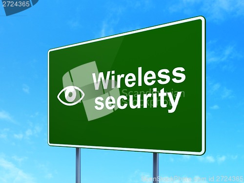 Image of Wireless Security and Eye on road sign background