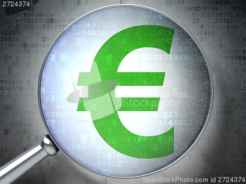 Image of Currency concept: Euro with optical glass on digital background