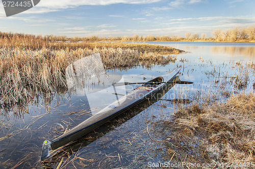 Image of racing sea kayak ready for paddling