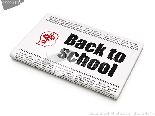 Image of Education concept: newspaper with Back to School and Head With Gears