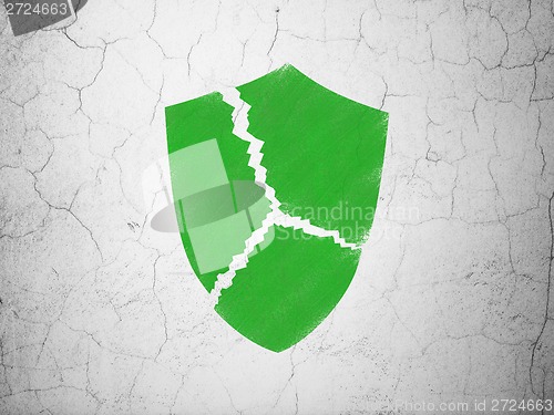 Image of Privacy concept: Broken Shield on wall background