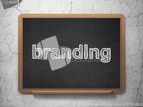 Image of Marketing concept: Branding on chalkboard background
