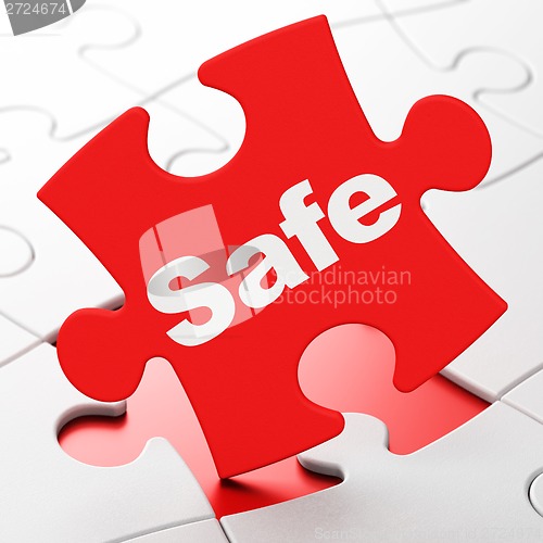 Image of Security concept: Safe on puzzle background