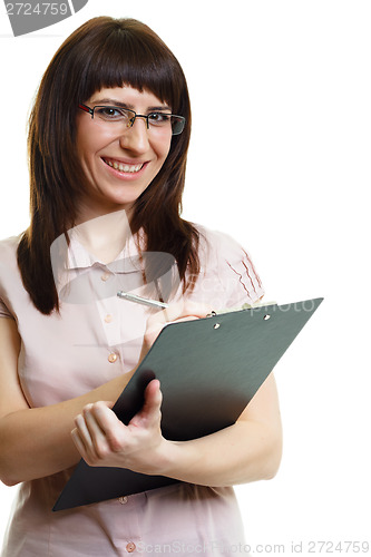 Image of young beautiful woman in glasses with a pen and documents