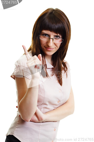 Image of young attractive girl in glasses strict