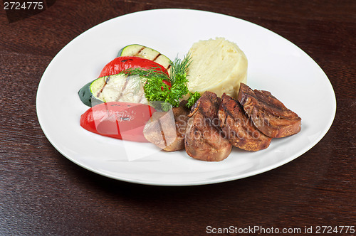 Image of tongue with grilled vegetable