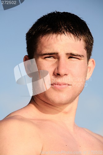 Image of Young man on the beach