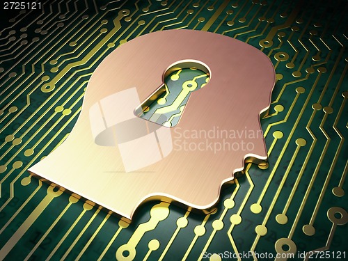 Image of Information concept: Head With Keyhole on circuit board background
