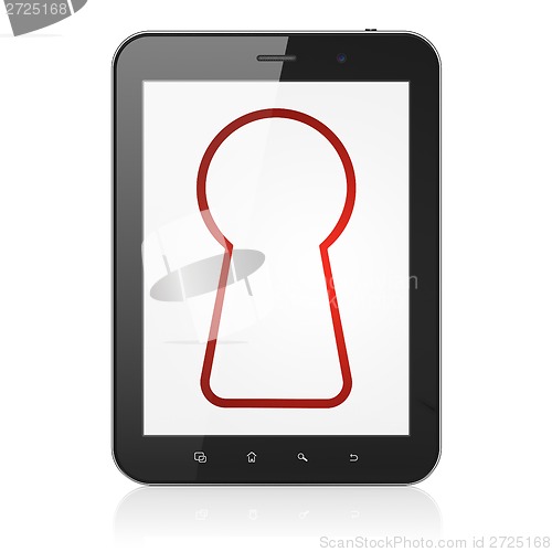 Image of Security concept: Keyhole on tablet pc computer