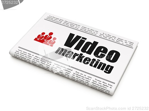 Image of Finance concept: newspaper with Video Marketing and Business Team