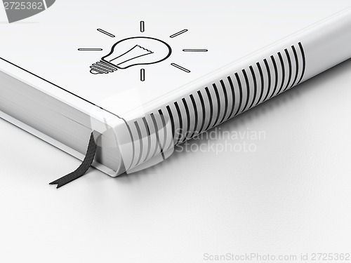 Image of Business concept: closed book, Light Bulb on white background