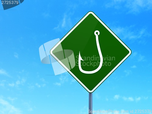 Image of Protection concept: Fishing Hook on road sign background