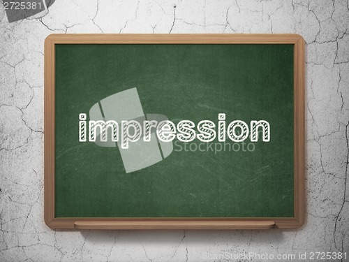Image of Advertising concept: Impression on chalkboard background