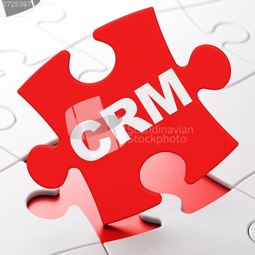 Image of Business concept: CRM on puzzle background
