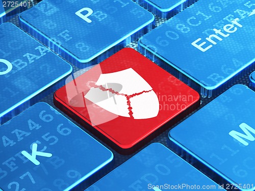 Image of Safety concept: Broken Shield on computer keyboard background