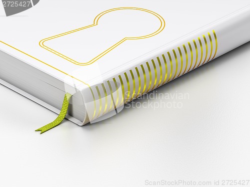 Image of Security concept: closed book, Keyhole on white background