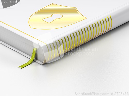 Image of Protection concept: closed book, Shield With Keyhole on white background