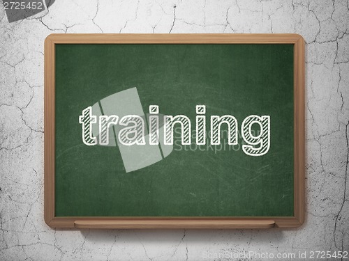Image of Education concept: Training on chalkboard background