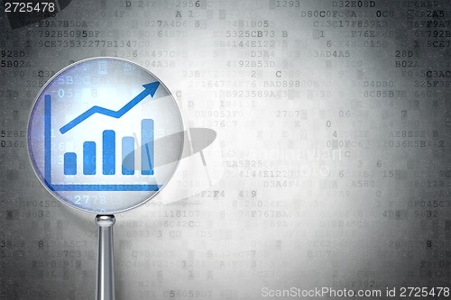 Image of Marketing concept:  Growth Graph with optical glass on digital background