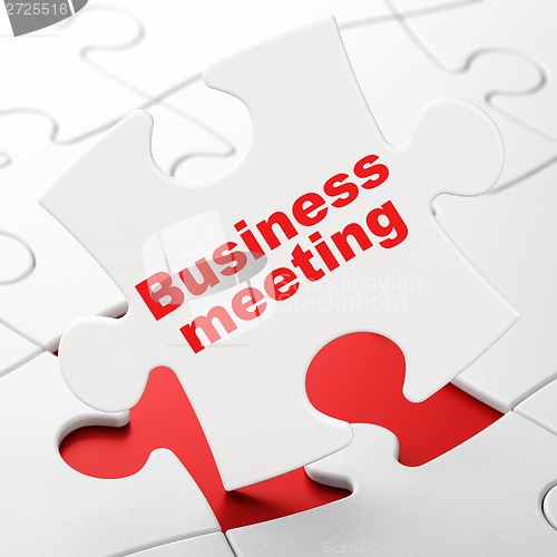 Image of Business Meeting on puzzle background