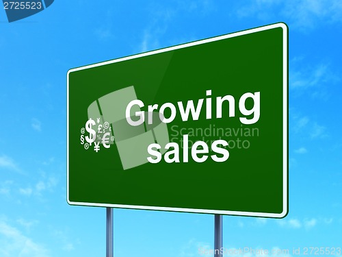 Image of Growing Sales and Finance Symbol on road sign background