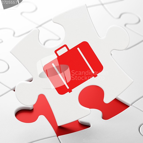 Image of Tourism concept: Bag on puzzle background