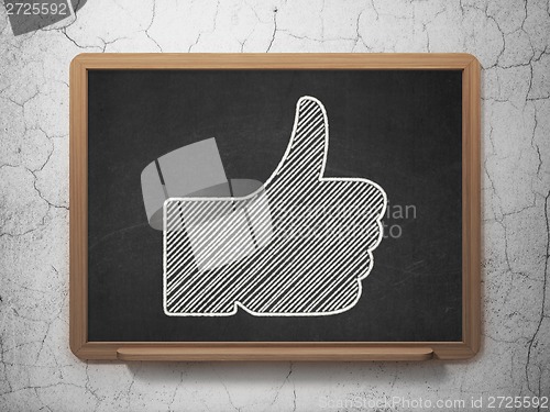 Image of Social network concept: Thumb Up on chalkboard background