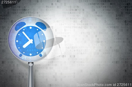 Image of Timeline concept:  Alarm Clock with optical glass on digital background