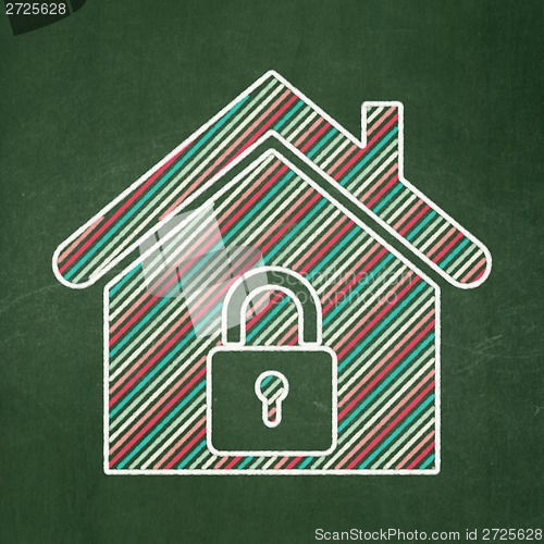 Image of Protection concept: Home on chalkboard background