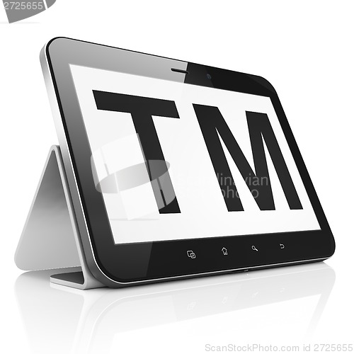 Image of Law concept: Trademark on tablet pc computer