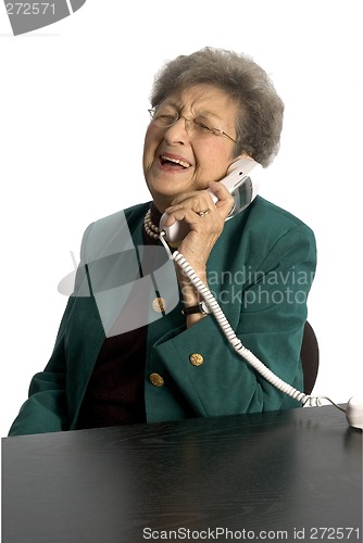 Image of laughing senior woman on telephone