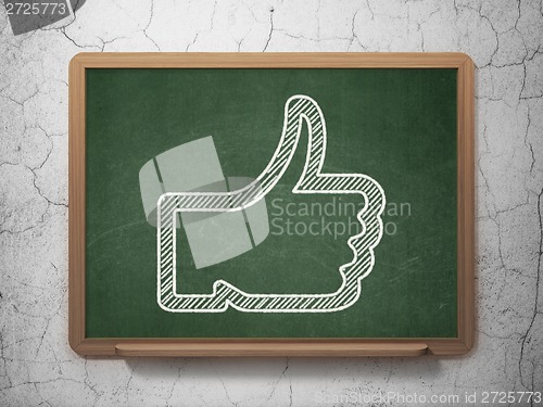 Image of Social network concept: Thumb Up on chalkboard background