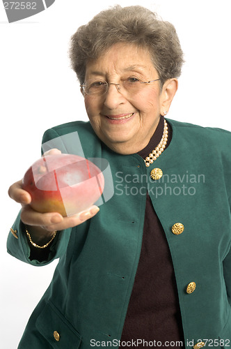 Image of senior woman with mango