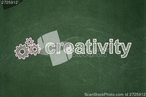 Image of Marketing concept: Gears and Creativity on chalkboard background