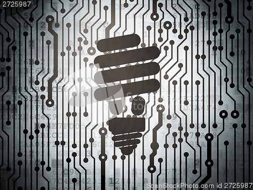 Image of Business concept: circuit board with Energy Saving Lamp