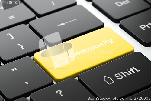 Image of Social media concept: Thumb Up and Community on computer keyboard background