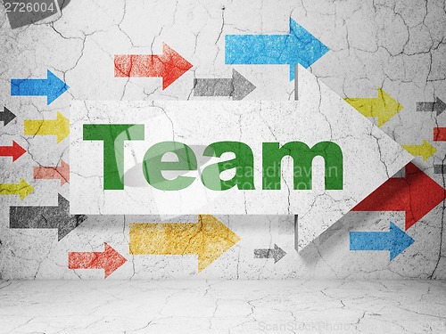 Image of Business concept: arrow with Team on grunge wall background