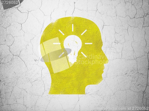 Image of Business concept: Head With Light Bulb on wall background