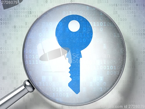 Image of Privacy concept: Key with optical glass on digital background