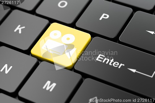 Image of Vacation concept: Camera on computer keyboard background