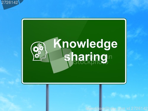 Image of Education concept: Knowledge Sharing and Head Gears on road sign