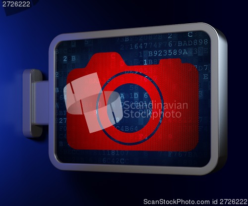 Image of Travel concept: Photo Camera on billboard background