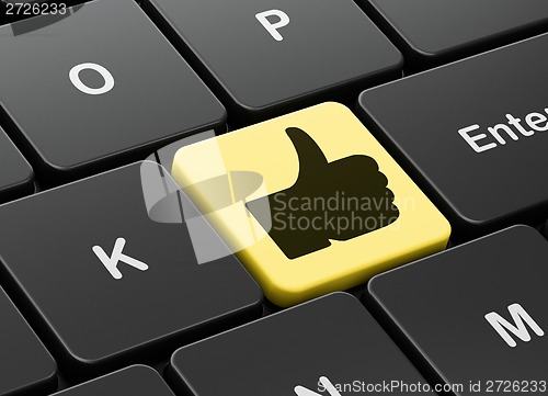 Image of Social media concept: Thumb Up on computer keyboard background