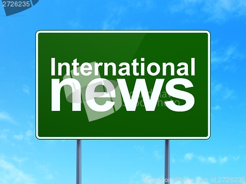 Image of International News on road sign background