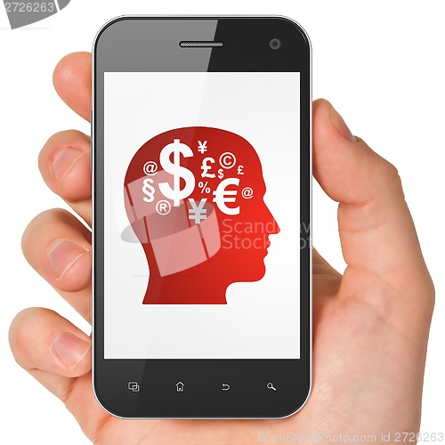 Image of Advertising concept: Head With Finance Symbol on smartphone