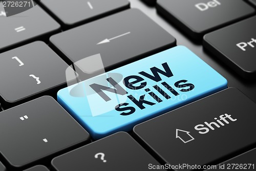 Image of Education concept: New Skills on computer keyboard background